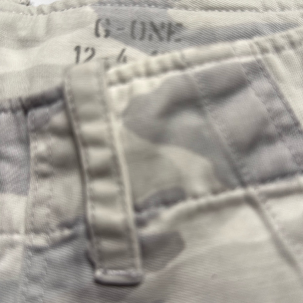 White and Grey G One camo pants . Straight Tapered to the Ankle .
